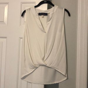 White sleeveless top